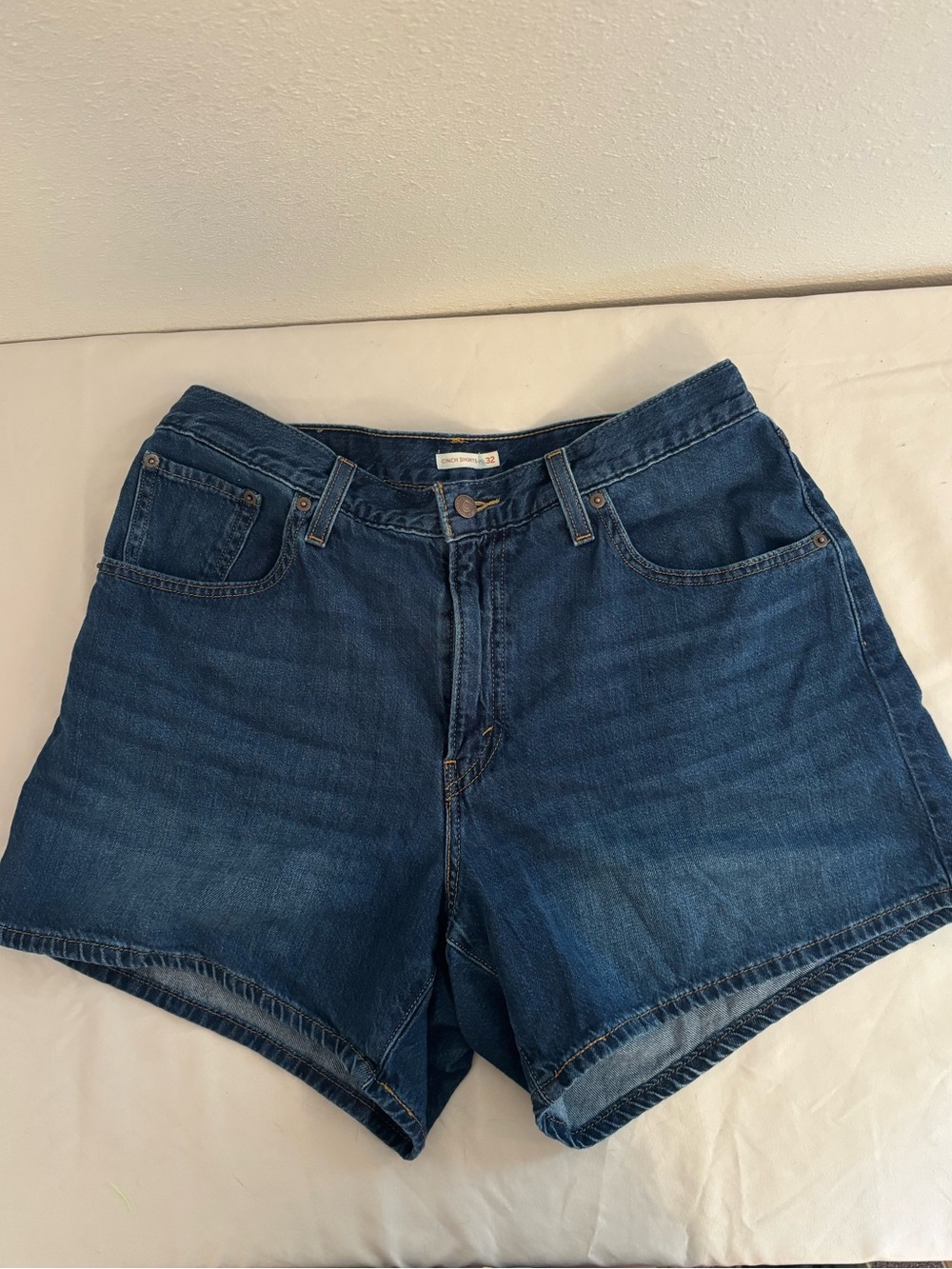 Levi’s Cinch High-Rise Dark Blue Denim Shorts